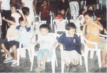 Children playing musical chairs