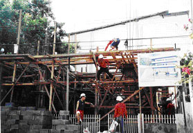 Construction workers building the new BLC addition