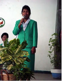 Elvie talking into microphone