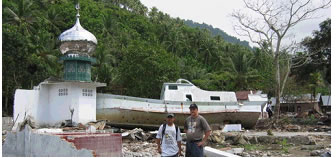 Fishing boat resting on mosque