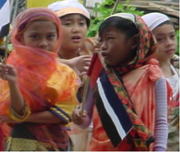 4 Children in costume with flags