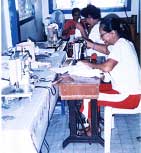 Two women working at sewing machines